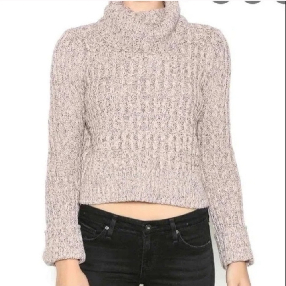 Free People Women's Twisted Cable Turtleneck Sweater has a cropped